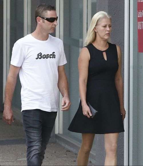 Heidi Strbak (right) is seen with family members while arriving at court. 