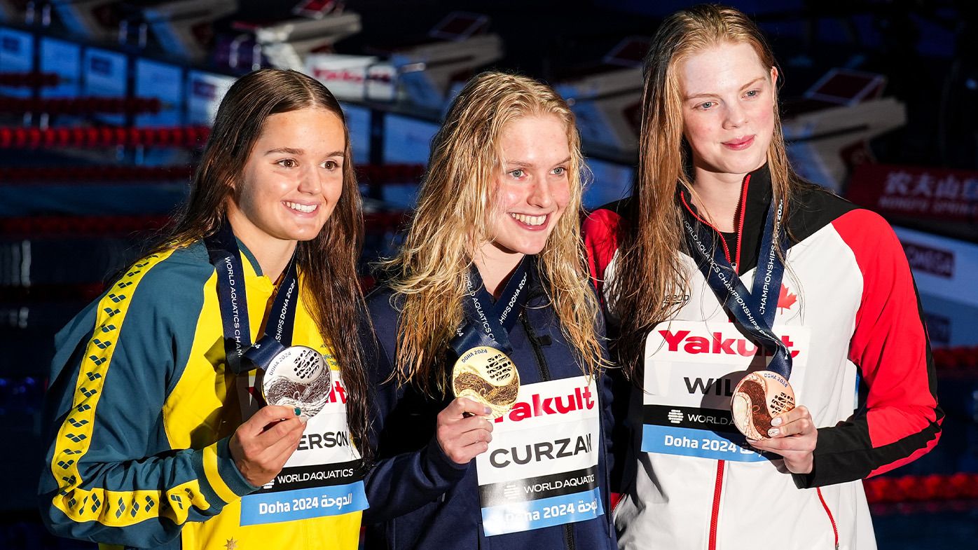 From left: Australia&#x27;s Iona Anderson, the USA&#x27;s Claire Curzan and Canada&#x27;s Ingrid Wilm pictured with their medals.
