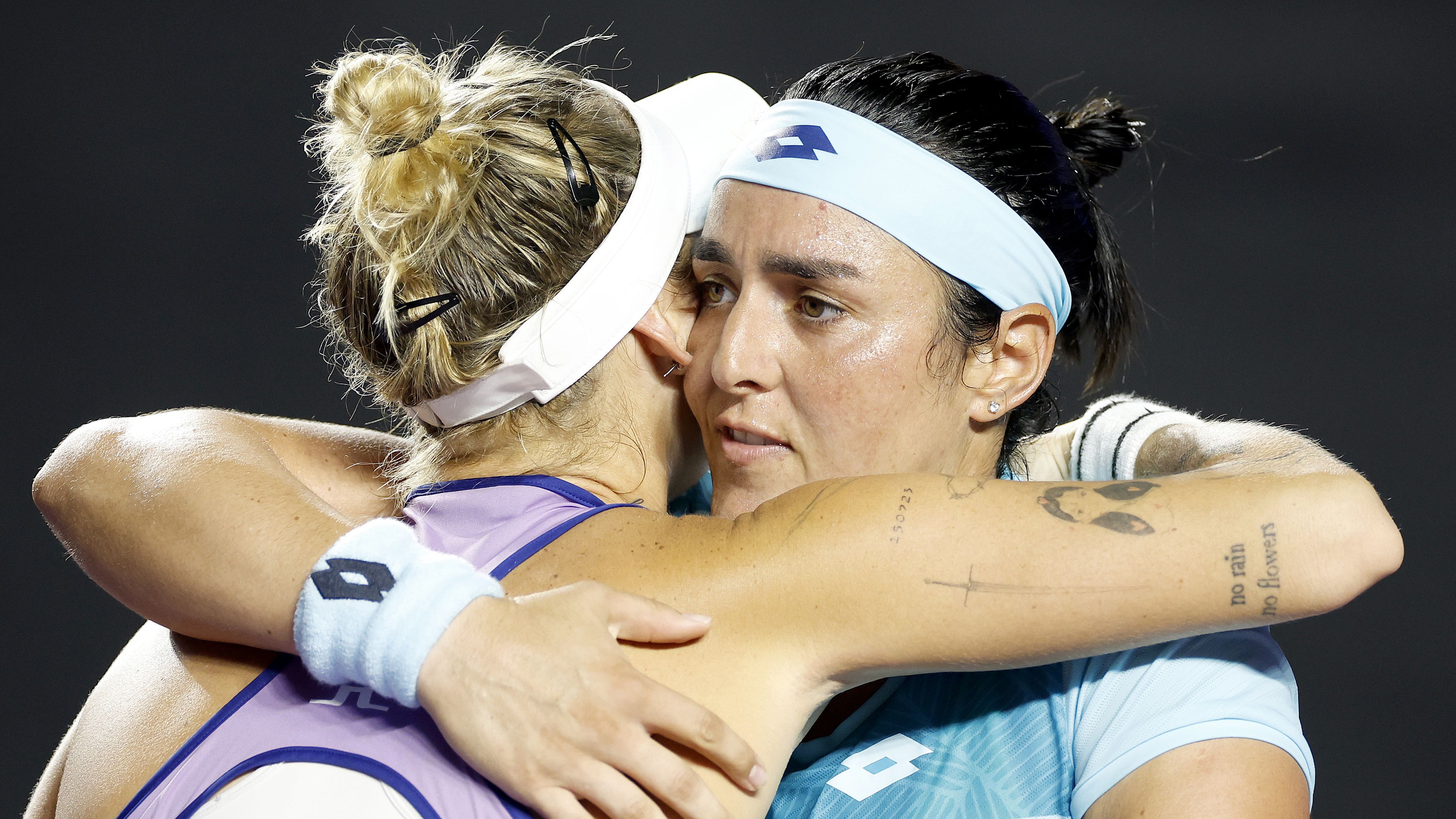 Marketa Vondrousova congratulates Ons Jabeur.