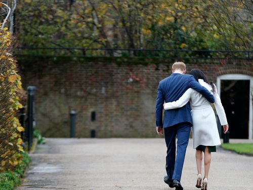 Job done, the couple stroll back to Nottingham Cottage, part of Kensington Palace. Picture: AAP