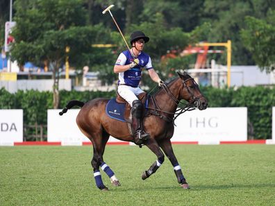 SINGAPORE, SINGAPORE - AUGUST 12: Prince Harry, The Duke of Sussex, Co-Founding Patron of Sentebale plays polo during the Sentebale ISPS Handa Polo Cup on August 12, 2023 in Singapore. The annual Polo Cup has been running since 2010, and to date has raised over £11 million to support Sentebale's work with children and young people affected by poverty, inequality and HIV/AIDS in southern Africa.  (Photo by Matt Jelonek/Getty Images for Sentebale)