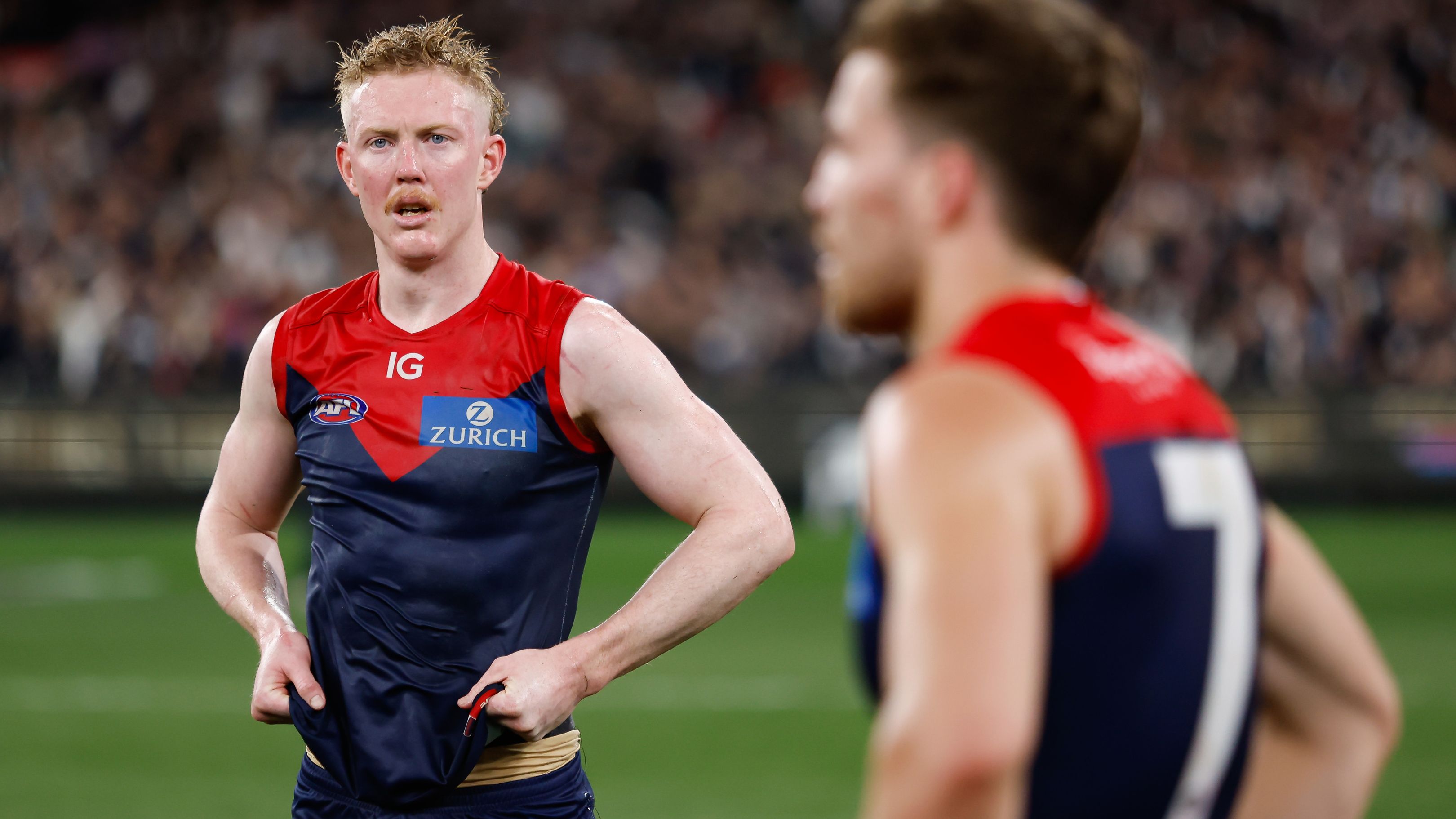 Clayton Oliver of the Demons looks dejected after a loss  during the 2023 AFL First Semi Final match between the Melbourne Demons and the Carlton Blues at Melbourne Cricket Ground on September 15, 2023 in Melbourne, Australia. (Photo by Dylan Burns/AFL Photos via Getty Images)