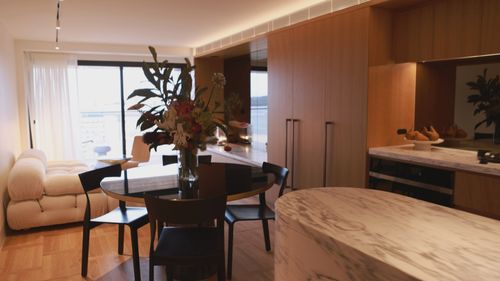 A﻿ former social housing block perched on prime real estate next to the Sydney Harbour Bridge has been transformed into luxury new apartments.