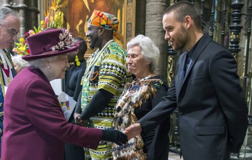 The Queen meets Liam Payne, of One Direction, who performed at the service. Picture: PA/AAP