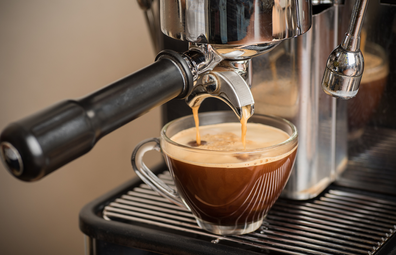 Espresso machine extracting coffee