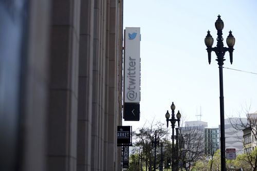 A sign outside the Twitter headquarters in San Francisco, Monday, April 25, 2022. Elon Musk reached an agreement to buy Twitter for roughly $44 billion on Monday, promising a more lenient touch to policing content on the platform where he promotes his interests, attacks critics and opines on social and economic issues to more than 83 million followers.(AP Photo/Jed Jacobsohn)