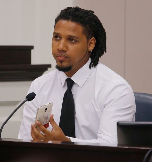 Feiden Santana holding the the cell phone he shot video with showing former North Charleston Police Officer Michael Slager's fatal encounter with Walter Scott (Image: AP)