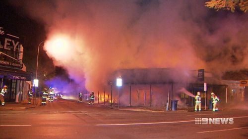 Three businesses burned to the ground. (9NEWS)