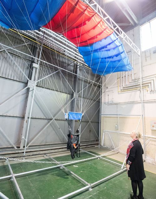 Defense barrrister Elizabeth Marsh QC looks at a hanging main parachute at Netheravon Airfield in Wiltshire, which was shown to the jury, where Army sergeant Emile Cilliers allegedly tampered with his wife Victoria Cilliers parachute