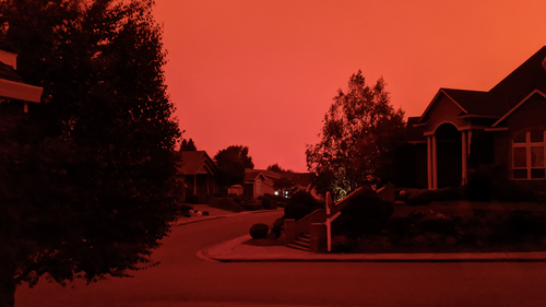 This photo taken from the home of Russ Casler in Salem, Ore., shows smoke-darkened sky around 5 p.m., Tuesday, Sept. 8, 2020, well before sunset.(Russ Casler via AP)