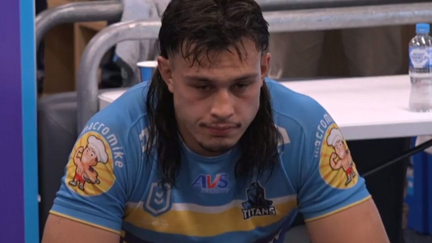 Titans skipper Tino Fa&#x27;asuamaleaui cut a frustrated figure in the sheds during the half-time break