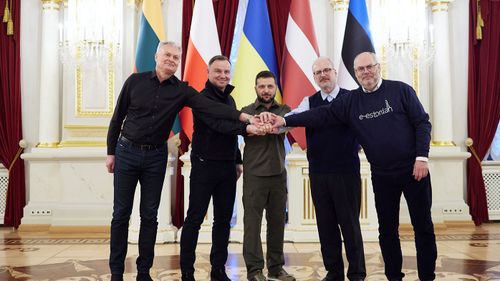 Lithuania's President Gitanas Nauseda, Polish President Andrzej Duda, Ukrainian President Volodymyr Zelenskyy, Latvian President Egils Levits and Estonia's President Alar Karis pose for a picture during their meeting in Kyiv, Ukraine