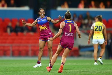 GOLD COAST, AUSTRALIA - NOVEMBER 18: Courtney Hodder of the Lions celebrates a goal during the AFLW Preliminary Final match between the Brisbane Lions and the Adelaide Crows at Metricon Stadium on November 18, 2022 in Gold Coast, Australia. (Photo by Chris Hyde/Getty Images)