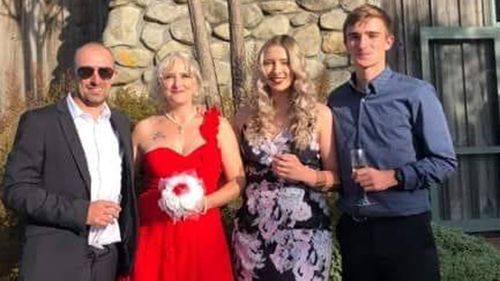Abby Hartley with husband Richard and her children Sophie and Toby, who flew to be by her side in Bali after she suffered a twisted bowel on holiday from New Zealand.