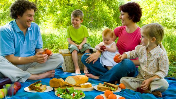 Family eats outdoors