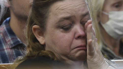 Wendy Rittenhouse, Kyle Rittenhouse's mother, tears up as he testifies.