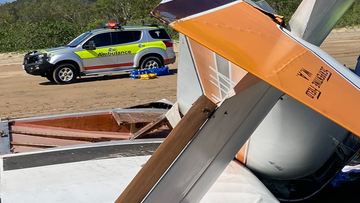 A man has been charged over a fatal light plane crash on Ball Bay Beach near Mackay, Queensland, on December 24, 2021.