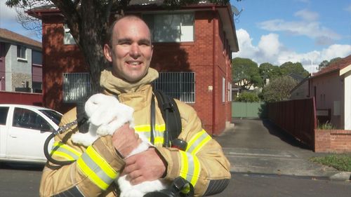 Firefighter Barry Warburton rescued the bunny from the apartment fire.