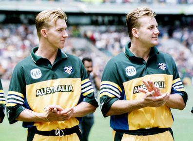 9 Jan 2000:  Brothers Brett Lee on left and Shane Lee of Australia applaud the National Anthem before the Carlton and United one day international against Australia at The Gabba, Brisbane, Australia. Mandatory Credit: Hamish Blair/ALLSPORT