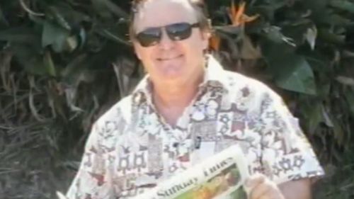 Peter Foster reads Fiji's The Sunday Times, in an image sent by him to Australian media. (9NEWS)