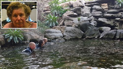 South Australian police drain the pond where Adelaide woman Helen Dansie drowned in April.