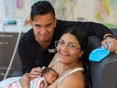 Renato and Vanessa Churches in hospital after welcoming their son, Bryson.