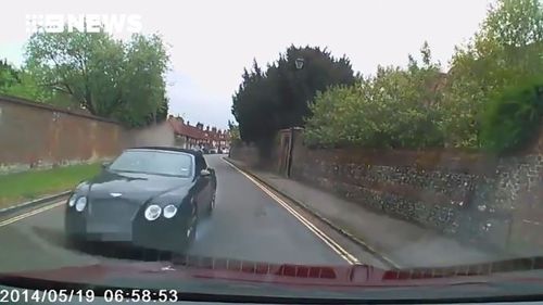 The smash saw the Bentley punt the Ford into a garden. (Supplied)