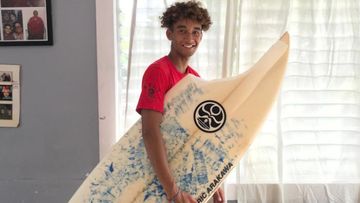 A shark took a huge chunk out of his surfboard
