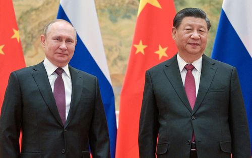 Russia's President Vladimir Putin (L) and his Chinese counterpart Xi Jinping pose during a meeting on February 4, 2022. Alexei Druzhinin/Russian Presidential Press and Information Office/TASS