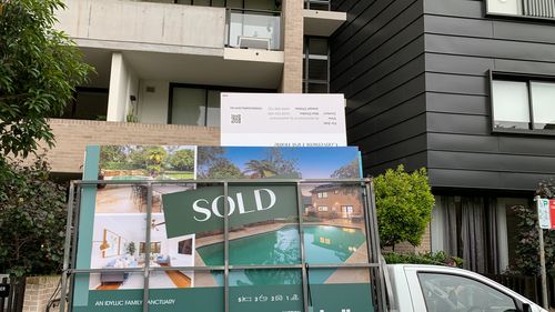 A sold sign outside a Sydney apartment building.
