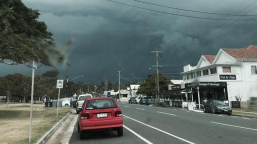 A post showing ominous clouds rolling through Queensland's south-east. (supplied)