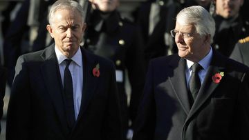 Former British Prime Ministers Tony Blair, left and John Major attend the Remembrance Sunday ceremony at the Cenotaph in Whitehall in London (Photo: November, 2019)