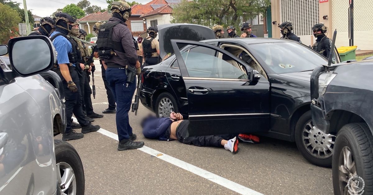 New video shows moment police intercepted alleged 'kill team' en route to hit