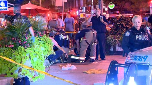 Emergency services at the corner of Danforth and Logan avenues in the Greektown area of Toronto. Picture: JeremyGlobalTV