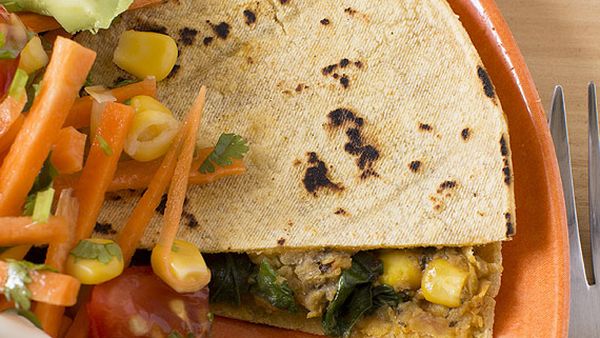 Spinach, corn and refried bean quesadillas with Mexican salad