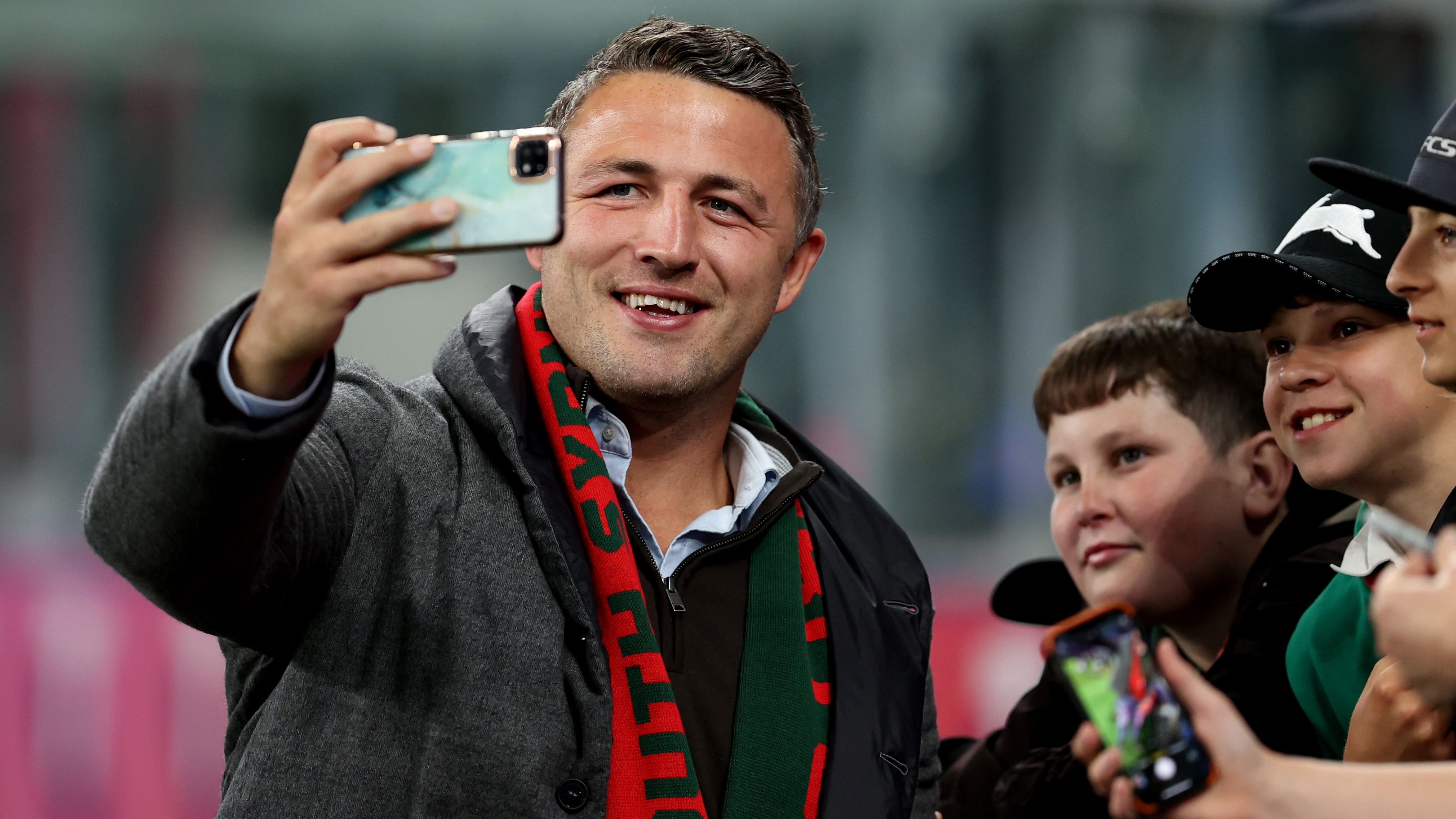 Sam Burgess takes a &#x27;selfie&#x27; with Rabbitohs fans ahead of the the NRL semi Ffinal match between Cronulla and the South Sydney.