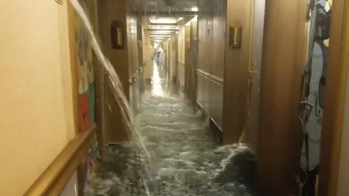 The water gushed into the hallways on deck 9 and into about 50 rooms. (Supplied)