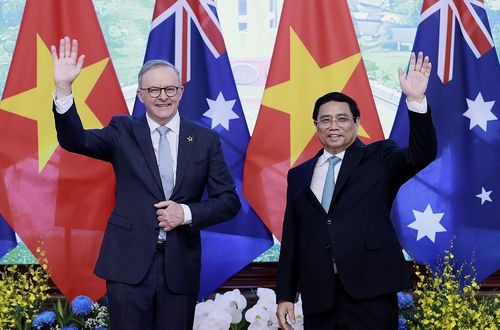Prime Minister Anthony Albanese, left, and Vietnamese Prime Minister Pham Minh Chinh pose for a photo ahead of their bilateral meeting in Hanoi, Vietnam on Sunday.