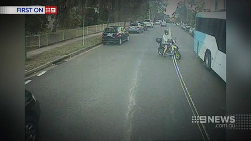 A motorcyclist cut off a bus in Randwick. (9NEWS)