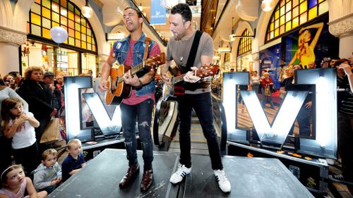 Guy Sebastian performs a Guerilla Gig for Channel V at the Queen Victoria Building in Sydney. (AAP)