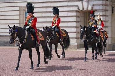 LONDON, ENGLAND - JUNE 02: Prince Charles, Prince of Wales (L), in his role as Colonel of the Welsh Guards, Prince William (C), Duke of Cambridge, in his role as Colonel of the Irish Guards, and Princess Anne (2R), Princess Royal, in her role as Colonel of the Blues and Royals, ride their horses along The Mall during Trooping The Colour on June 2, 2022 in London, England.Trooping The Colour, also known as The Queen's Birthday Parade, is a military ceremony performed by regiments of the British A