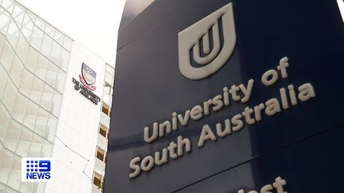 South Australia's two biggest universities have signed an historic agreement that will see them become one by 2026.