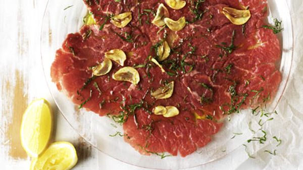Raw beef fillet with mint, oregano, garlic and lemon