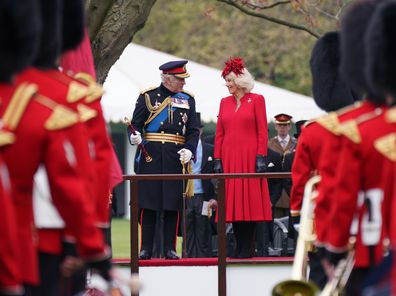King Charles III and the Queen Consort during a ceremony where they presented new Standards and Colours to the Royal Navy; the Life Guards of the Household Cavalry Mounted Regiment; The King's Company of the Grenadier Guards, and The King's Colour Squadron of the Royal Air Force, at Buckingham Palace on April 27, 2023, in London 