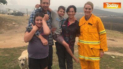 The Bos family with reporter Christine Ahern. 