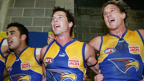 Cousins (centre) in his West Coast playing days. (AAP)