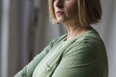 A woman looking sombre