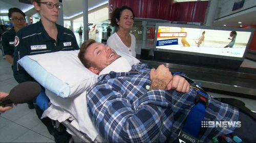 Danny Westwood was reunited with his mother Karen Triffett this afternoon when he touched down in Perth after a mercy flight home.