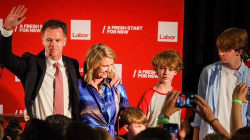 Chris Minns celebrates his election win with his family.