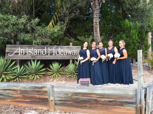 The bridesmaids were all smiles at the ceremony despite their horror hotel stay. (Supplied)